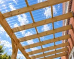 Clear CorruTuf polycarbonate roofing sheet showing the rounded 76/18 corrugated profile